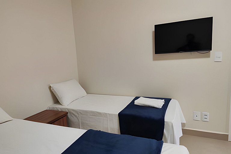 Casa NOVA c/ ar e tv em todos quartos e garagem