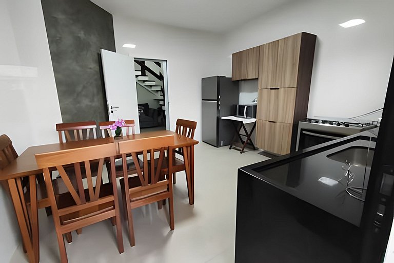 Casa NOVA c/ ar e tv em todos quartos e garagem