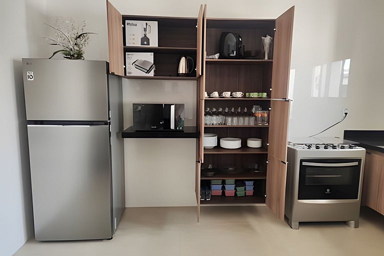 Casa NOVA c/ ar e tv em todos quartos e garagem