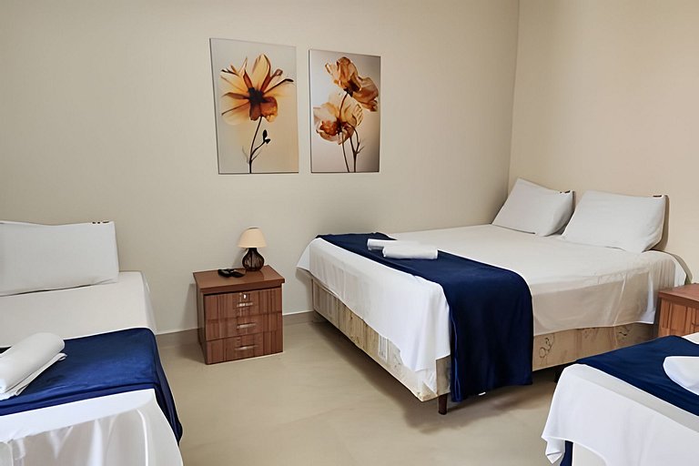 Casa NOVA c/ ar e tv em todos quartos e garagem