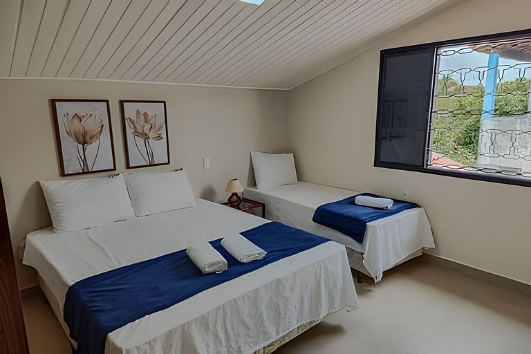 Casa NOVA c/ ar e tv em todos quartos e garagem