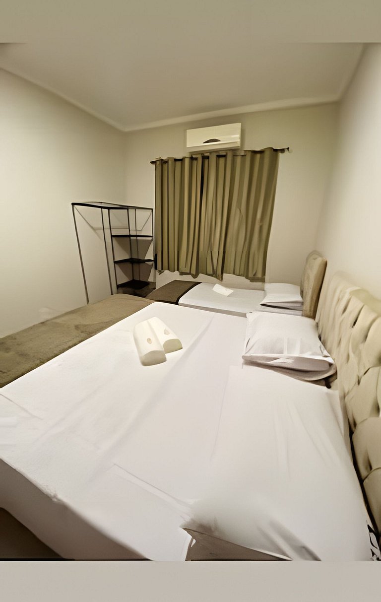 apto térreo a pé ao santuário 3 qts ar e garagem