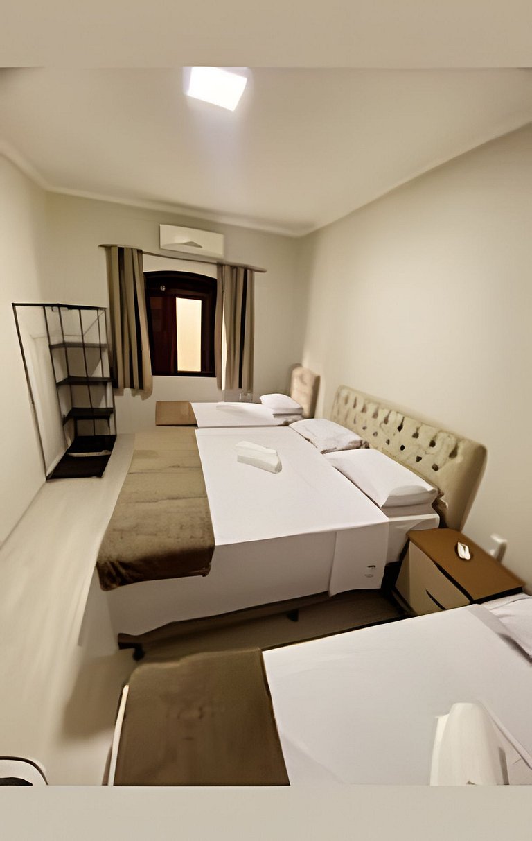 apto térreo a pé ao santuário 3 qts ar e garagem