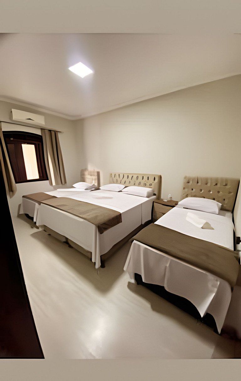 apto térreo a pé ao santuário 3 qts ar e garagem