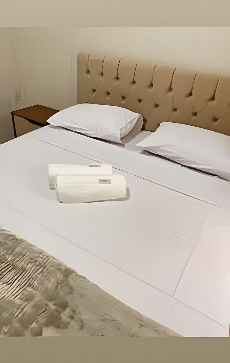 apto térreo a pé ao santuário 3 qts ar e garagem